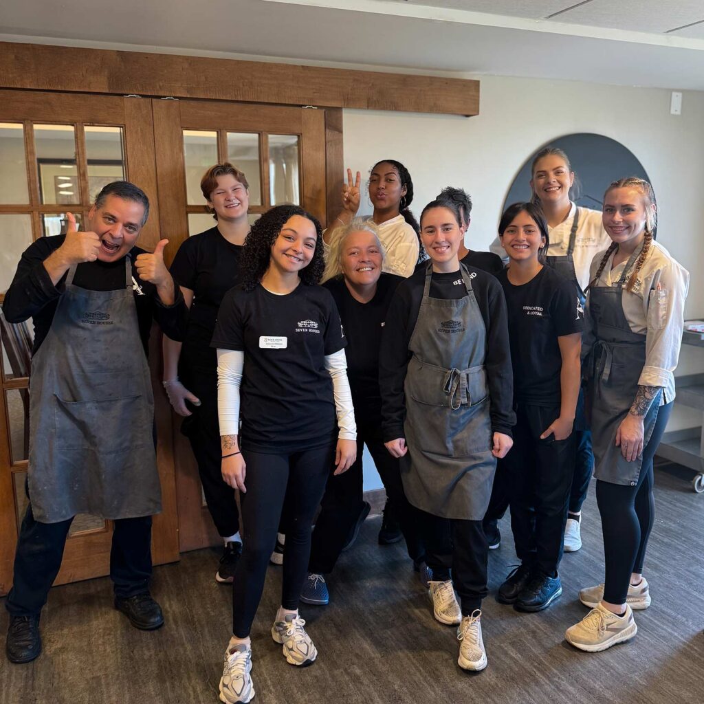 Group photo of the team at Rock Creek Senior Living, smiling brightly.